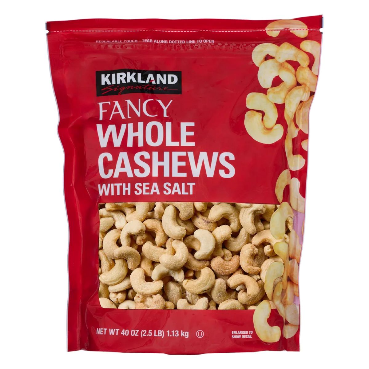 A red 40-ounce bag of Kirkland Signature Fancy Whole Cashews with Sea Salt, featuring an image of cashews and product details on the front.