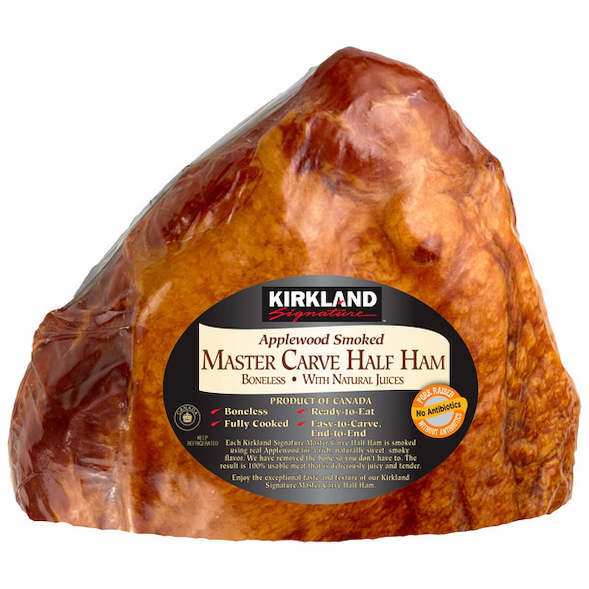A large, brown, applewood smoked ham with a shiny glaze, labeled "Kirkland Signature Master Carve Half Ham" on the front, wrapped in clear packaging.