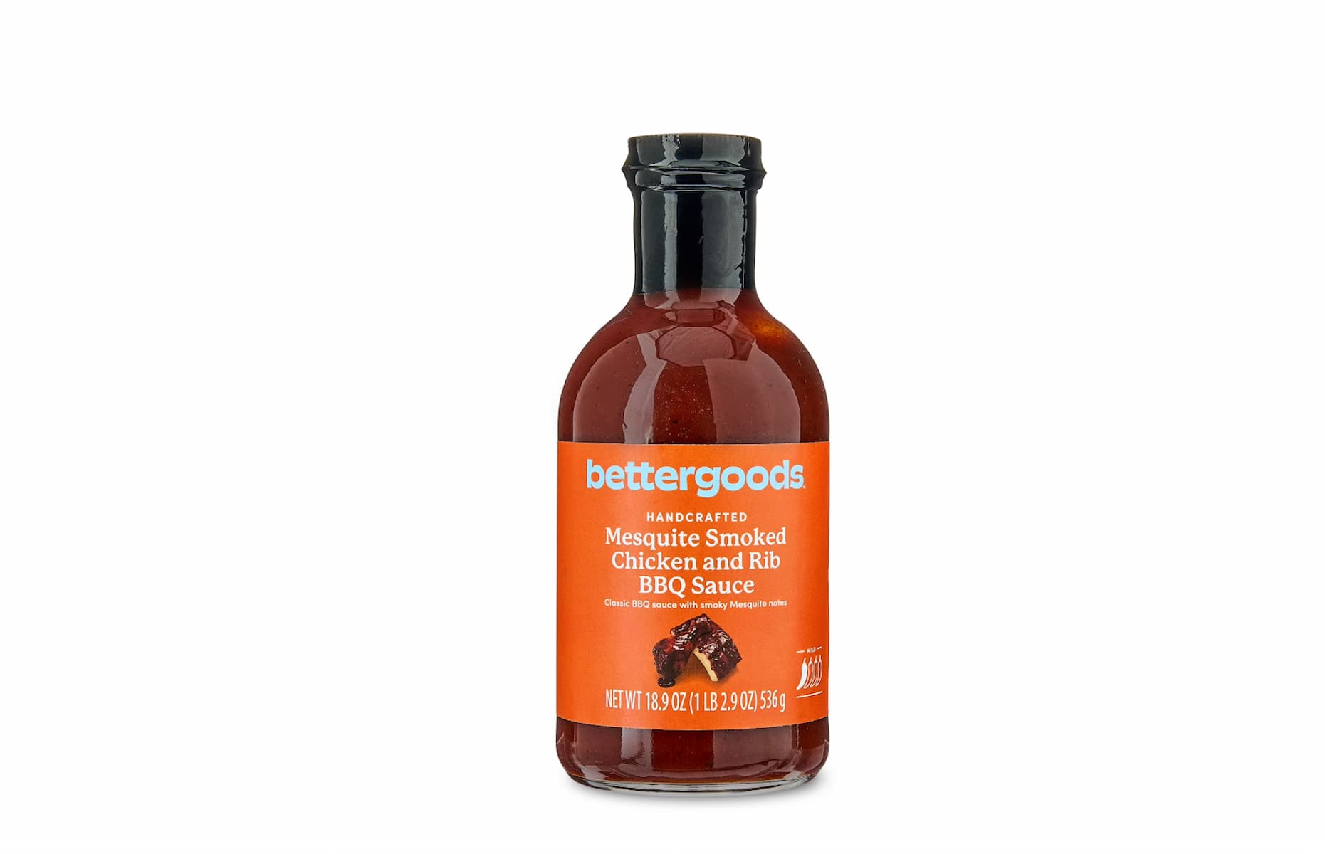 A bottle of bettergoods Mesquite Smoked Chicken and Rib BBQ Sauce with an orange label, displayed against a white background. The bottle contains 18.9 ounces (535g) of sauce.