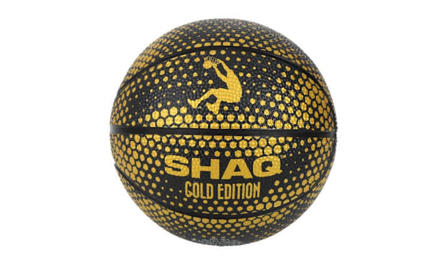 Black basketball with a gold dotted pattern, featuring a gold silhouette of a player dunking and the text "SHAQ GOLD EDITION" on the front—one of the standout new Five Below products.