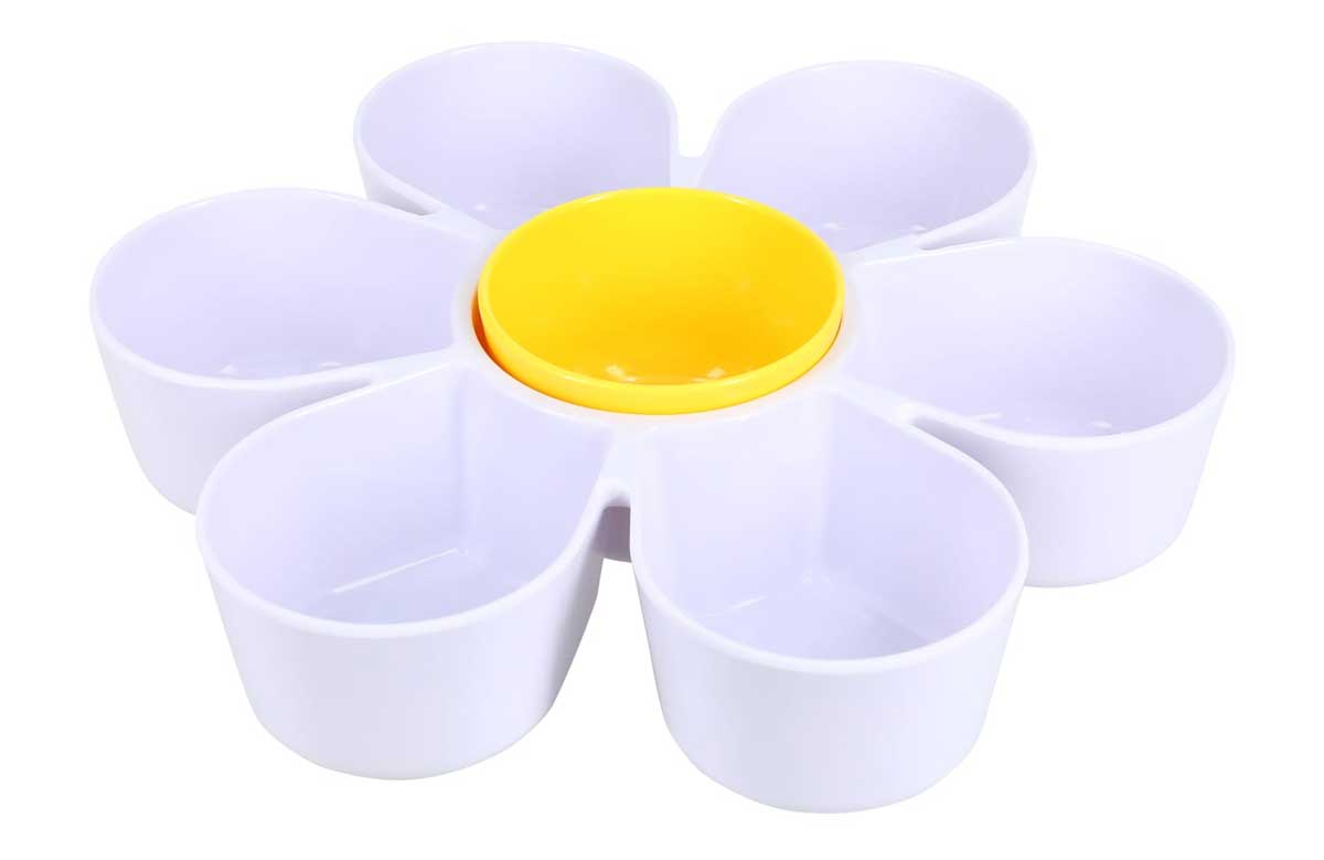 A white, flower-shaped plastic serving tray with six petal compartments and a round yellow center—one of the stylish new Five Below products perfect for parties or snacking.