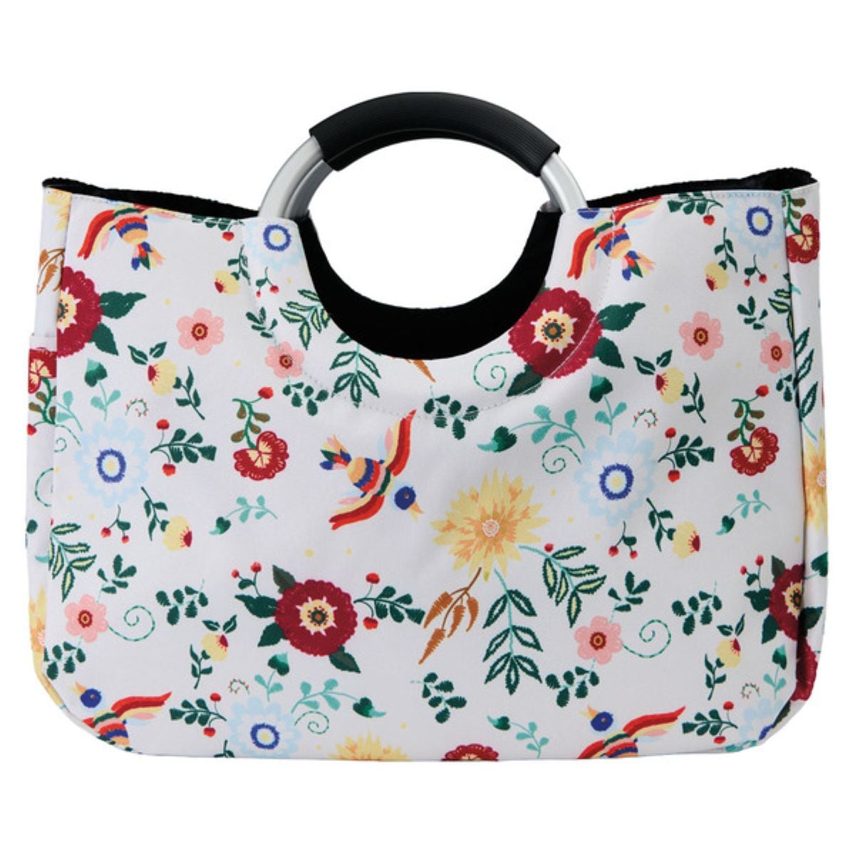 A white handbag with black handles, decorated with a colorful floral pattern featuring red, yellow, and orange flowers and green leaves.