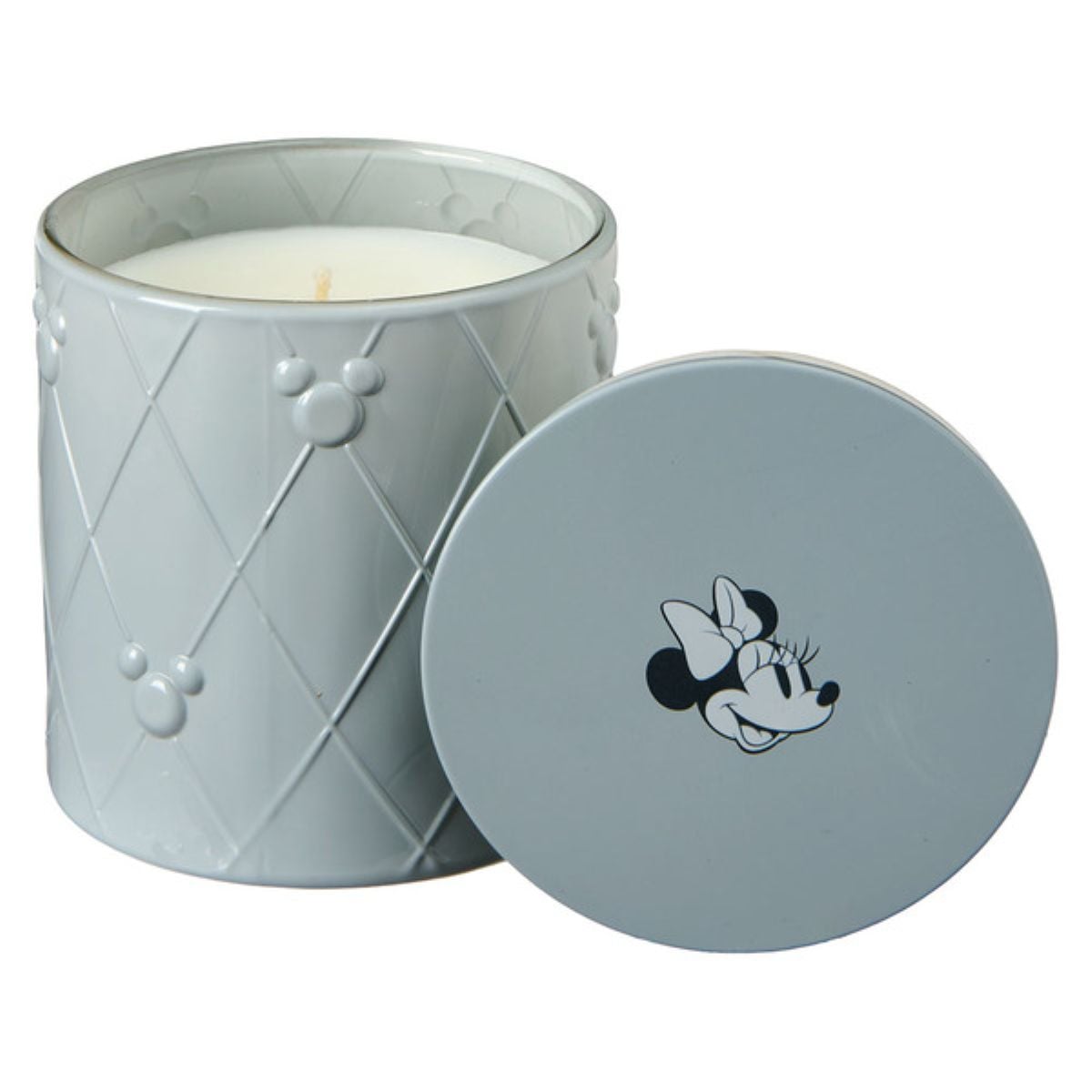 A white candle in a textured light gray jar with embossed Mickey Mouse silhouettes. The lid, placed beside the jar, features an illustration of Minnie Mouse's face.