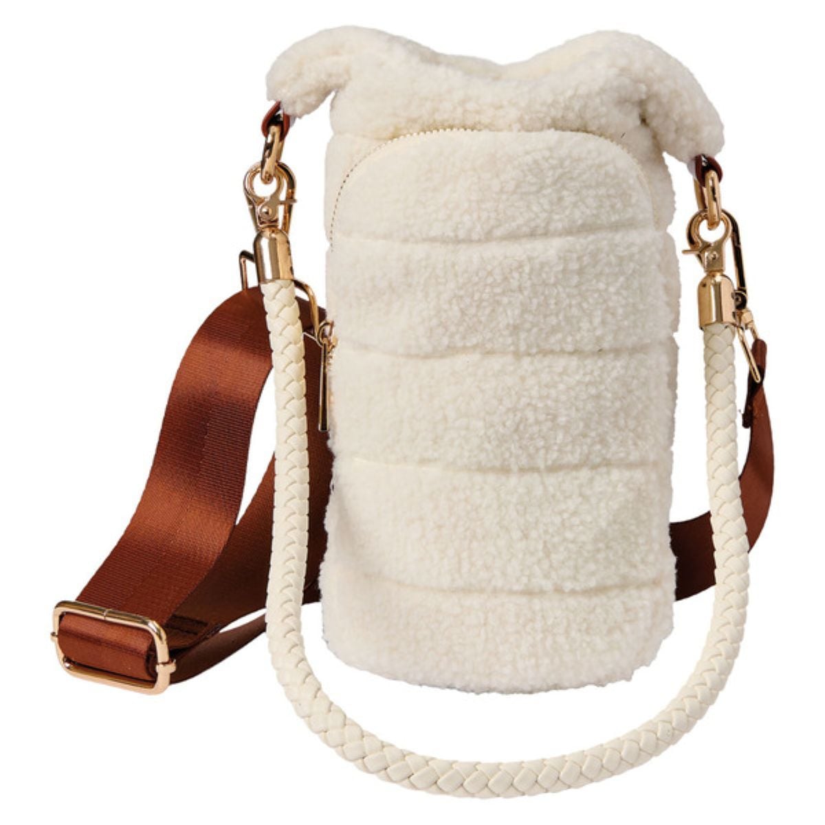 A cylindrical, cream-colored, sherpa fleece bag with a gold zipper, brown adjustable shoulder strap, and a braided cream handle. The bag has a plush, textured appearance and gold hardware accents.