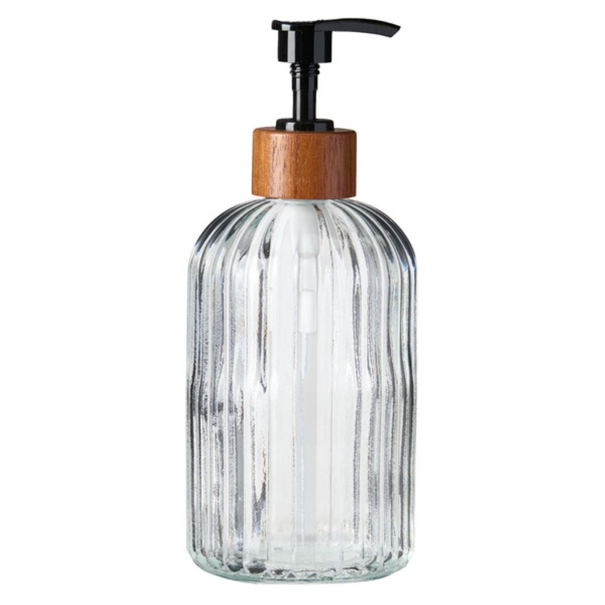 A clear ribbed glass soap dispenser with a wooden collar and a black pump top, standing against a white background.
