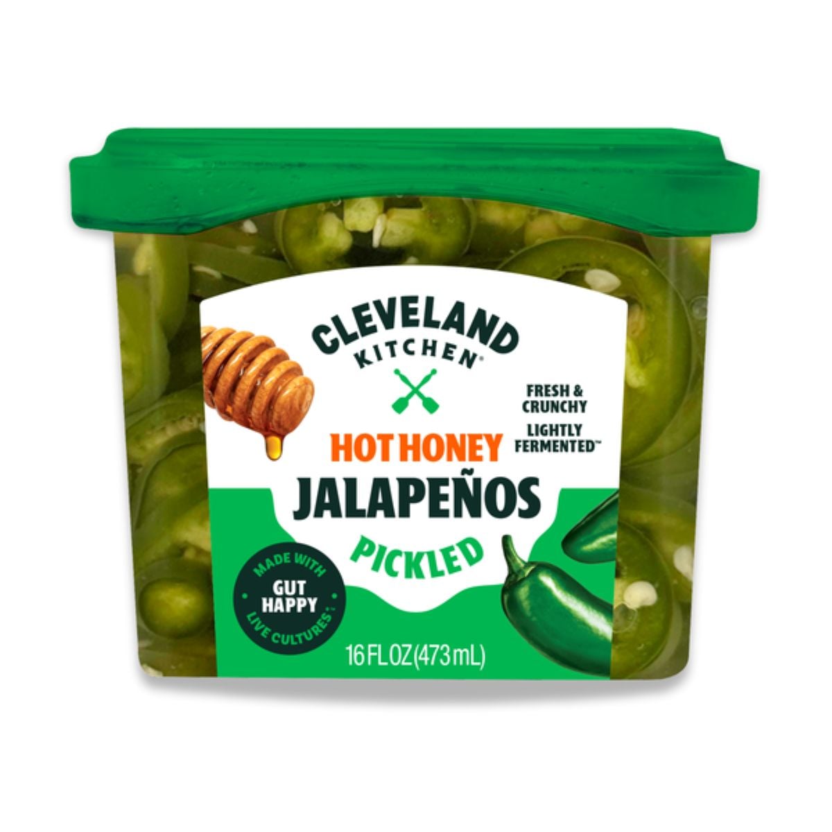 A 16oz container of Cleveland Kitchen Hot Honey Pickled Jalapeños with a green lid. The label shows sliced jalapeños, a honey dipper, and product claims like "fresh & crunchy" and "lightly fermented.