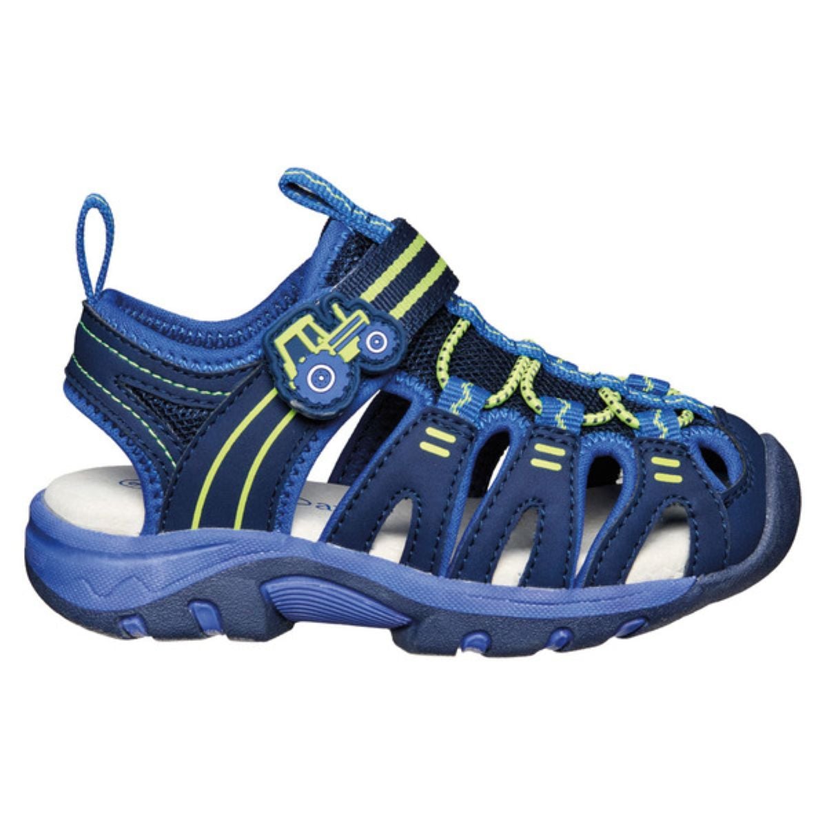 A blue and navy children’s sandal with neon green accents, yellow stitching, a closed toe, and a small tractor graphic on the adjustable strap. The sandal features a rugged sole and breathable design.