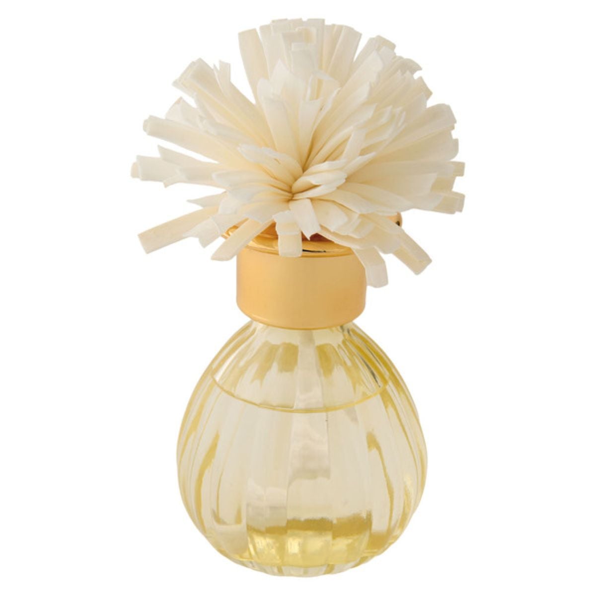 A glass perfume bottle filled with yellow liquid, topped with a gold cap and a cream-colored, flower-shaped decorative accent.