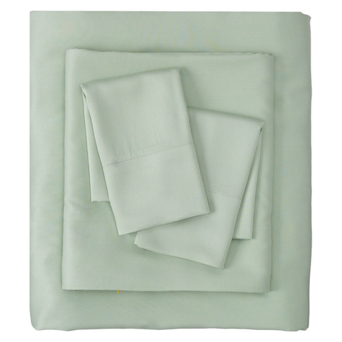 A neatly folded set of light green bed sheets, including a fitted sheet, a flat sheet, and two pillowcases, arranged on a flat surface.