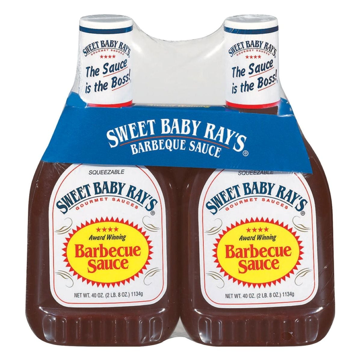 Two bottles of Sweet Baby Ray’s Barbecue Sauce in a plastic pack, featuring blue labels on the caps and "Barbecue Sauce Award Winning" on the front label of each bottle.