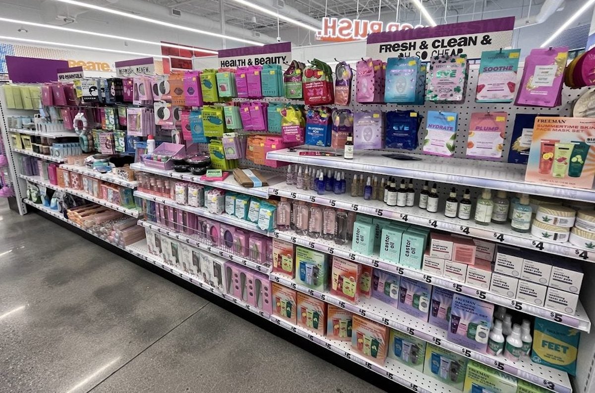 A well-lit store aisle displays shelves stocked with various health and beauty products, perfect for your first time at Five Below—find face masks, lotions, soaps, and skincare items in colorful packaging, all organized neatly by type.