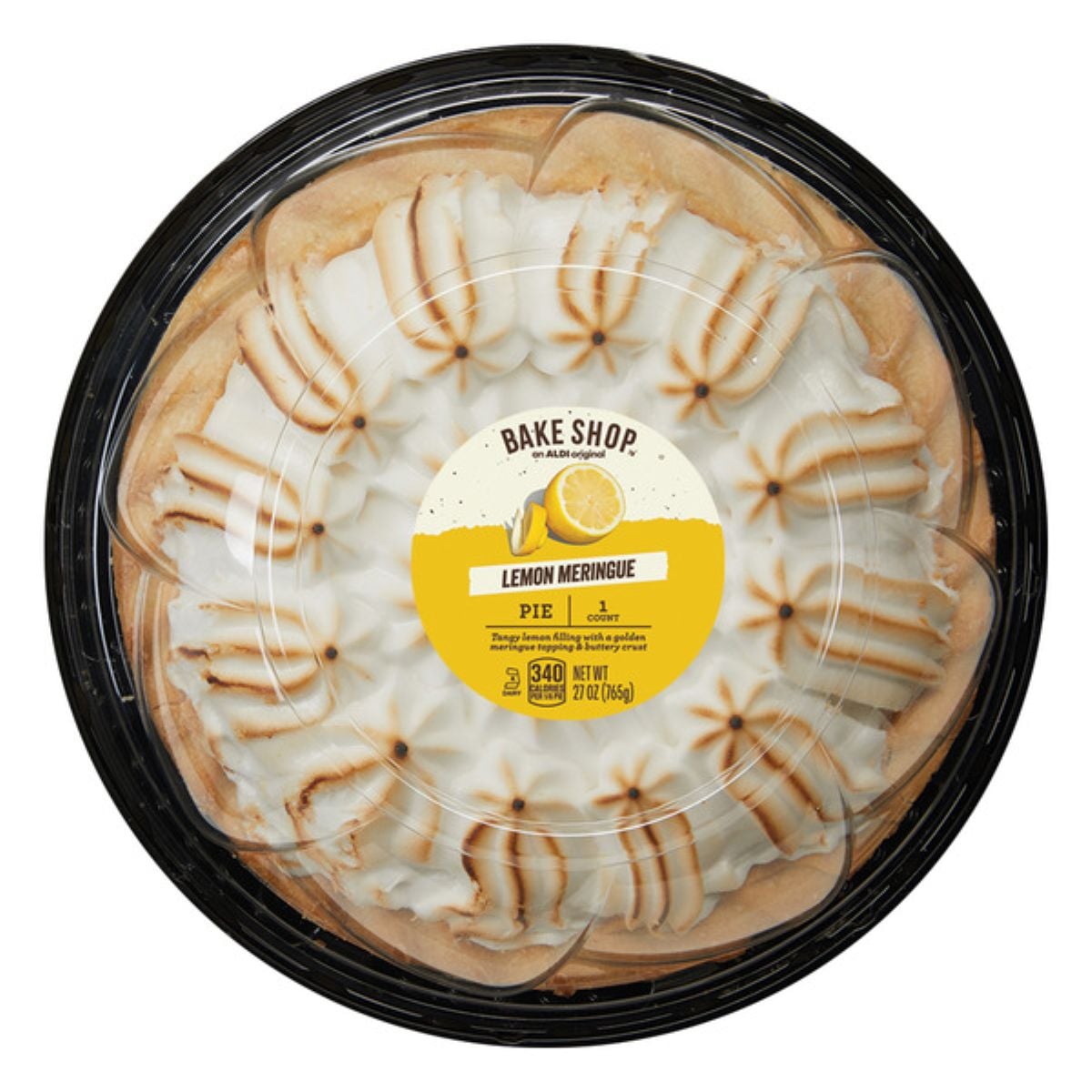 A round lemon meringue pie in a black plastic container with a clear lid, topped with browned meringue swirls. The yellow label in the center reads "Bake Shop Lemon Meringue Pie.