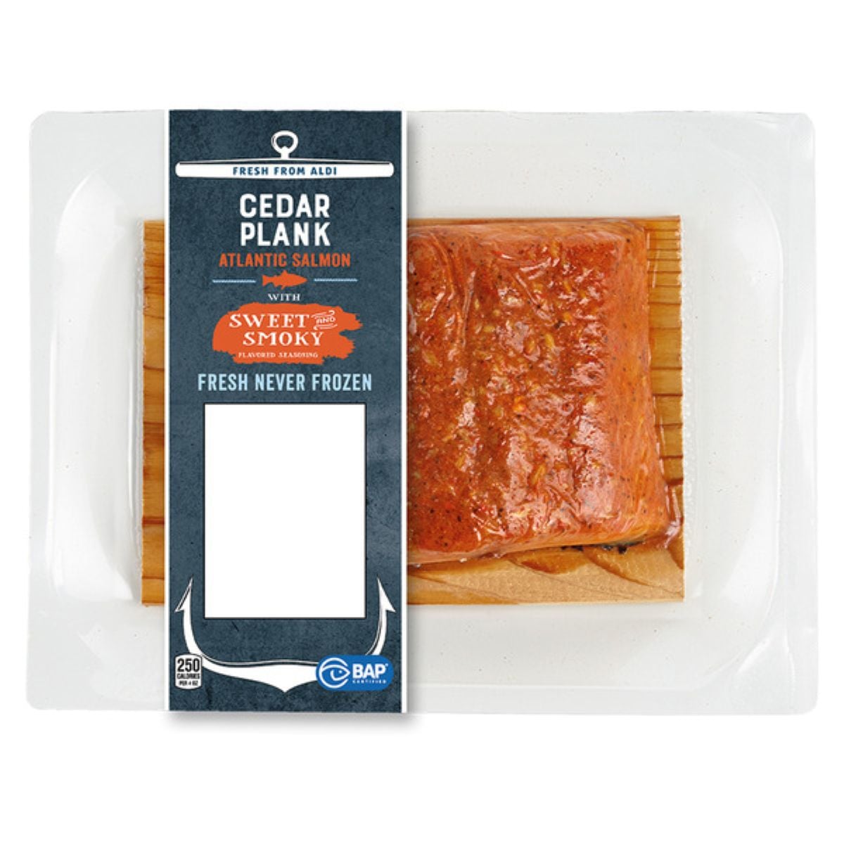 Packaged cedar plank Atlantic salmon with a sweet and smoky glaze, labeled “Fresh Never Frozen,” inside a clear plastic container with a dark blue and white label and nutrition information on the front.
