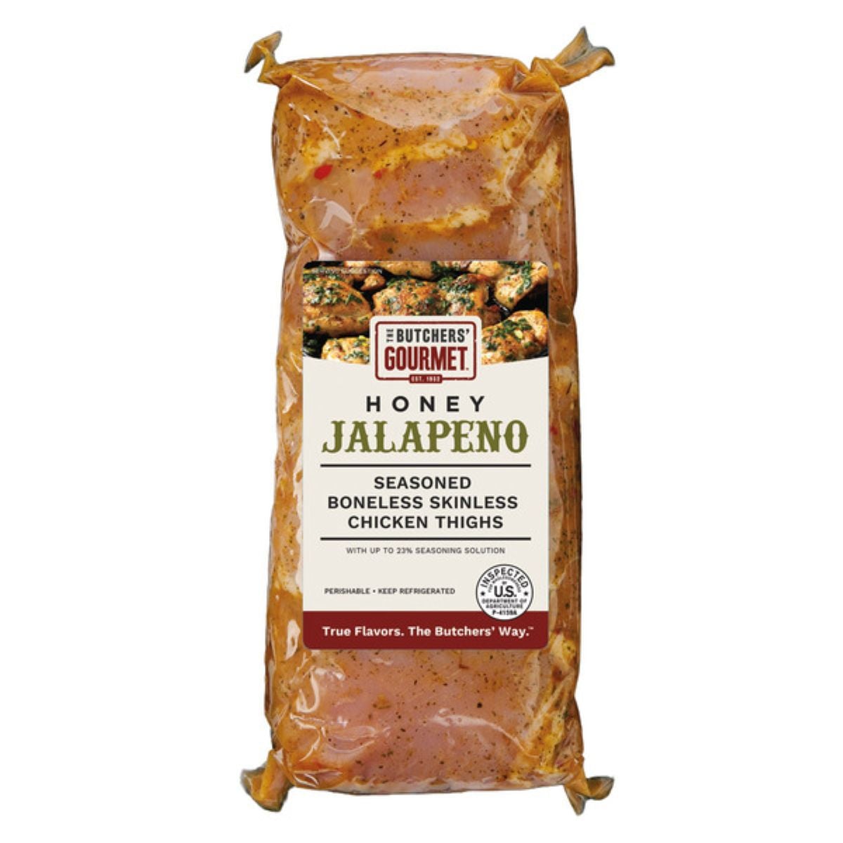 Vacuum-sealed package of The Butcher’s Gourmet Honey Jalapeno seasoned boneless skinless chicken thighs with visible marinade and label showing product details.