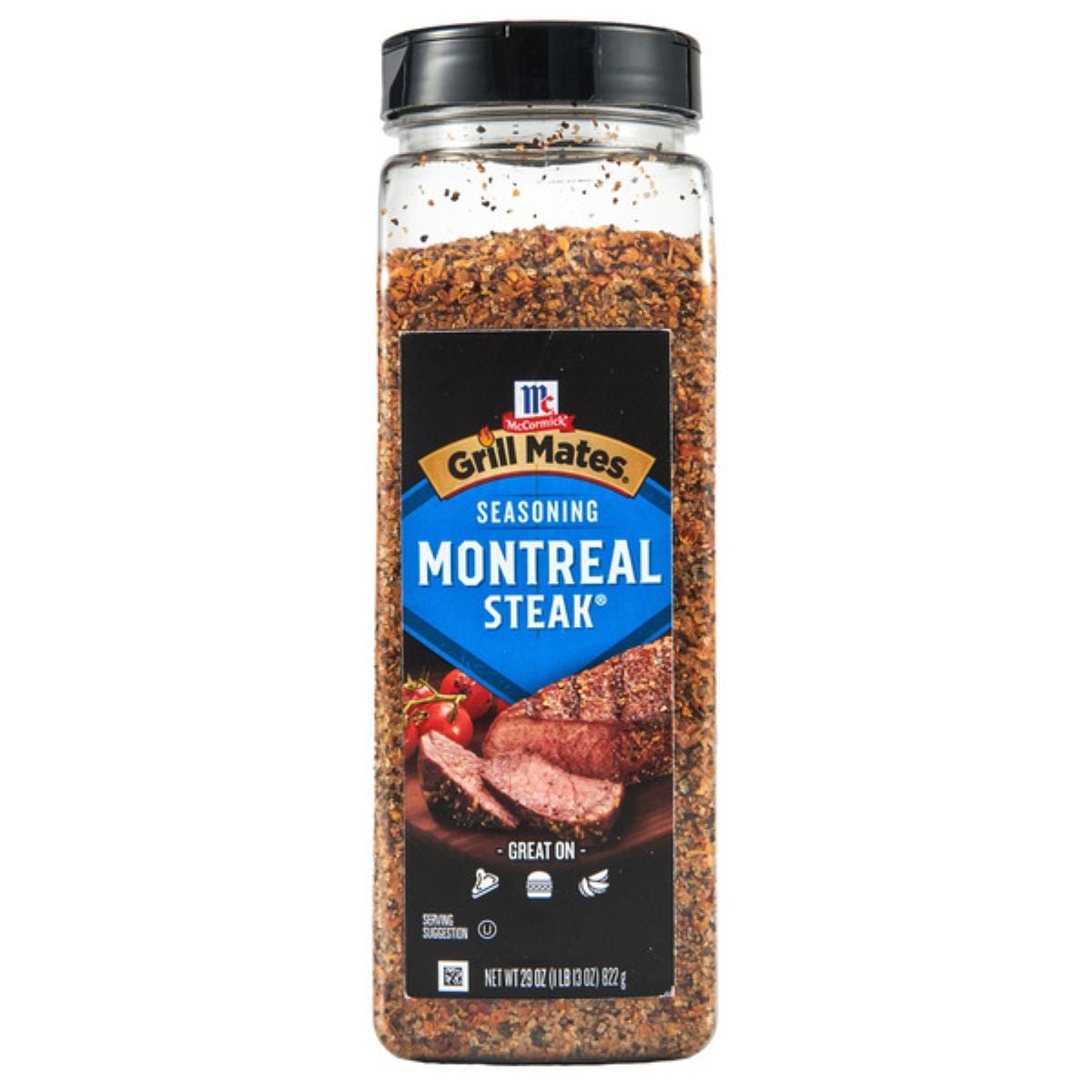 A large container of McCormick Grill Mates Montreal Steak Seasoning with a clear body showing the spice blend, a black lid, and a label featuring steak slices and tomatoes.