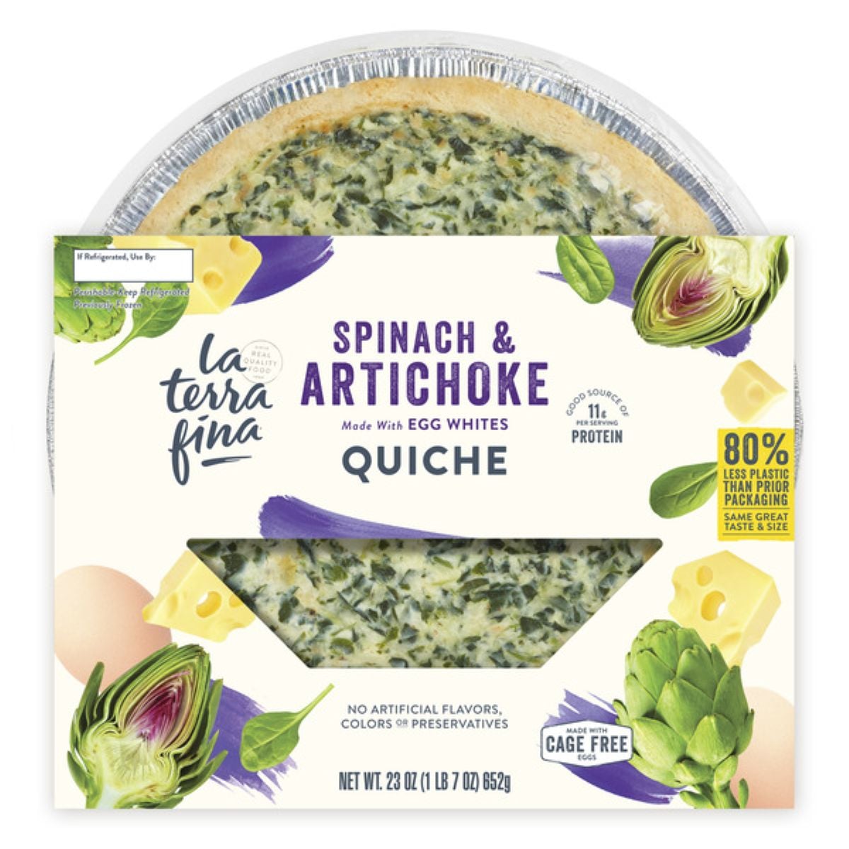 A package of La Terra Fina Spinach & Artichoke Quiche with visible quiche inside, spinach and artichoke illustrations, cheese pieces, and text highlighting 80% less plastic and cage-free eggs. Net weight is 23 oz (652g).