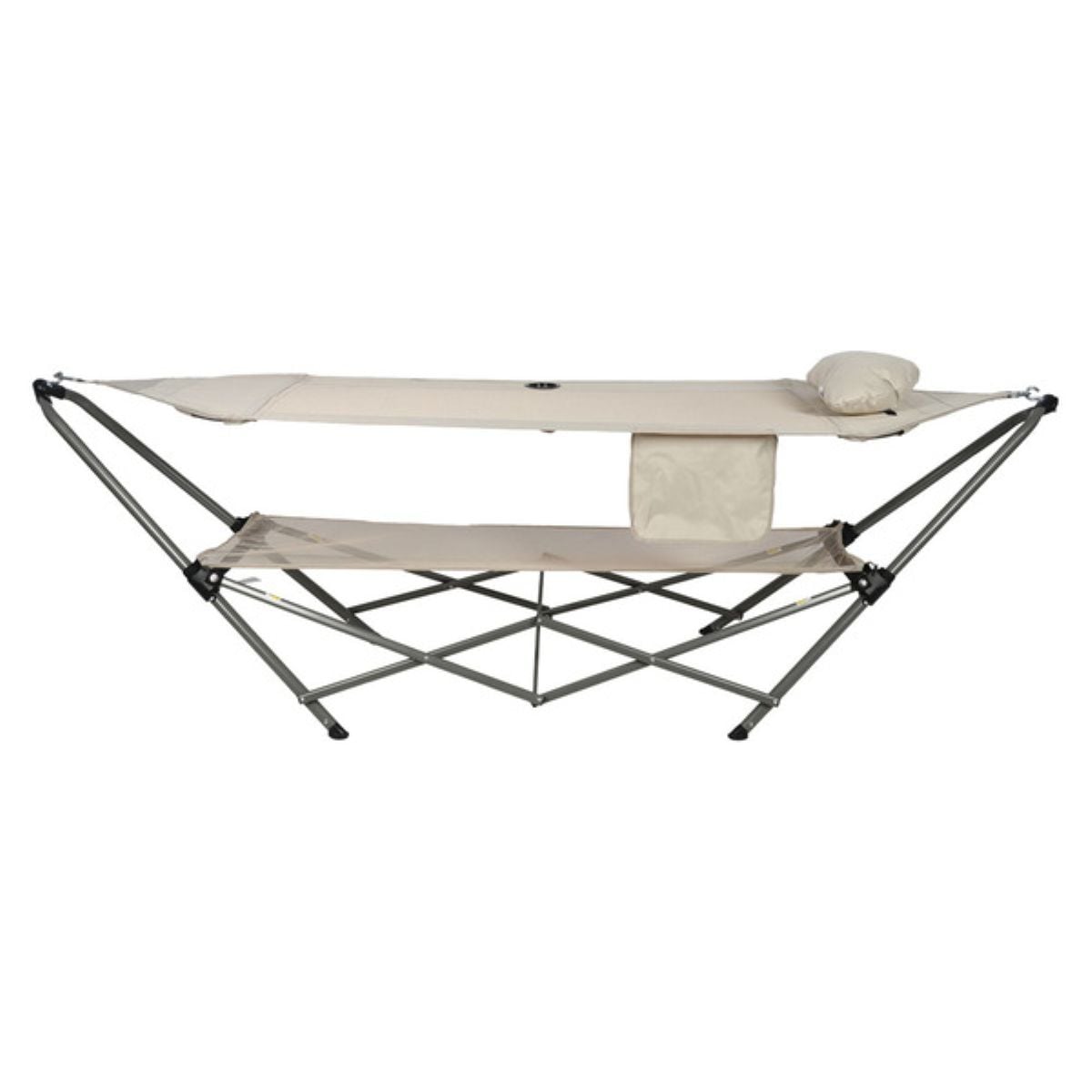 A portable folding hammock with a beige fabric sling, matching pillow, and storage pouch, supported by a collapsible metal frame.