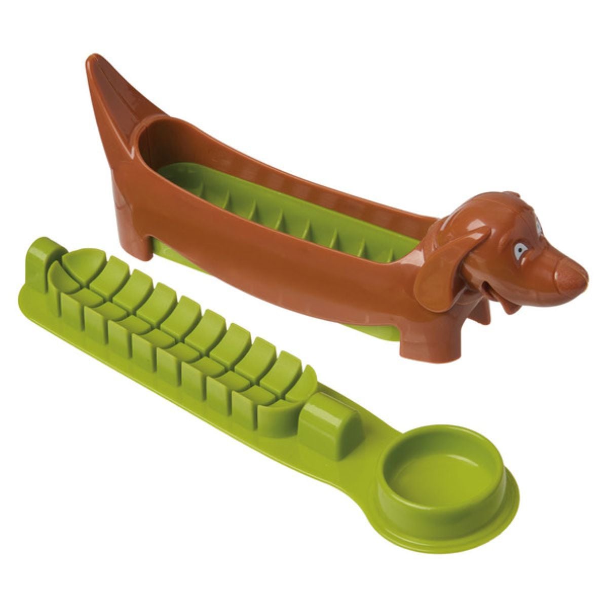A brown plastic hot dog holder shaped like a dachshund beside a green slicing guide and condiment tray, both with slots designed to hold and slice a hot dog evenly.