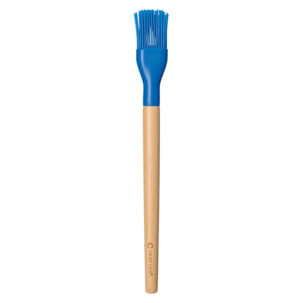 A kitchen pastry brush with a long wooden handle and blue silicone bristles, standing upright against a white background.