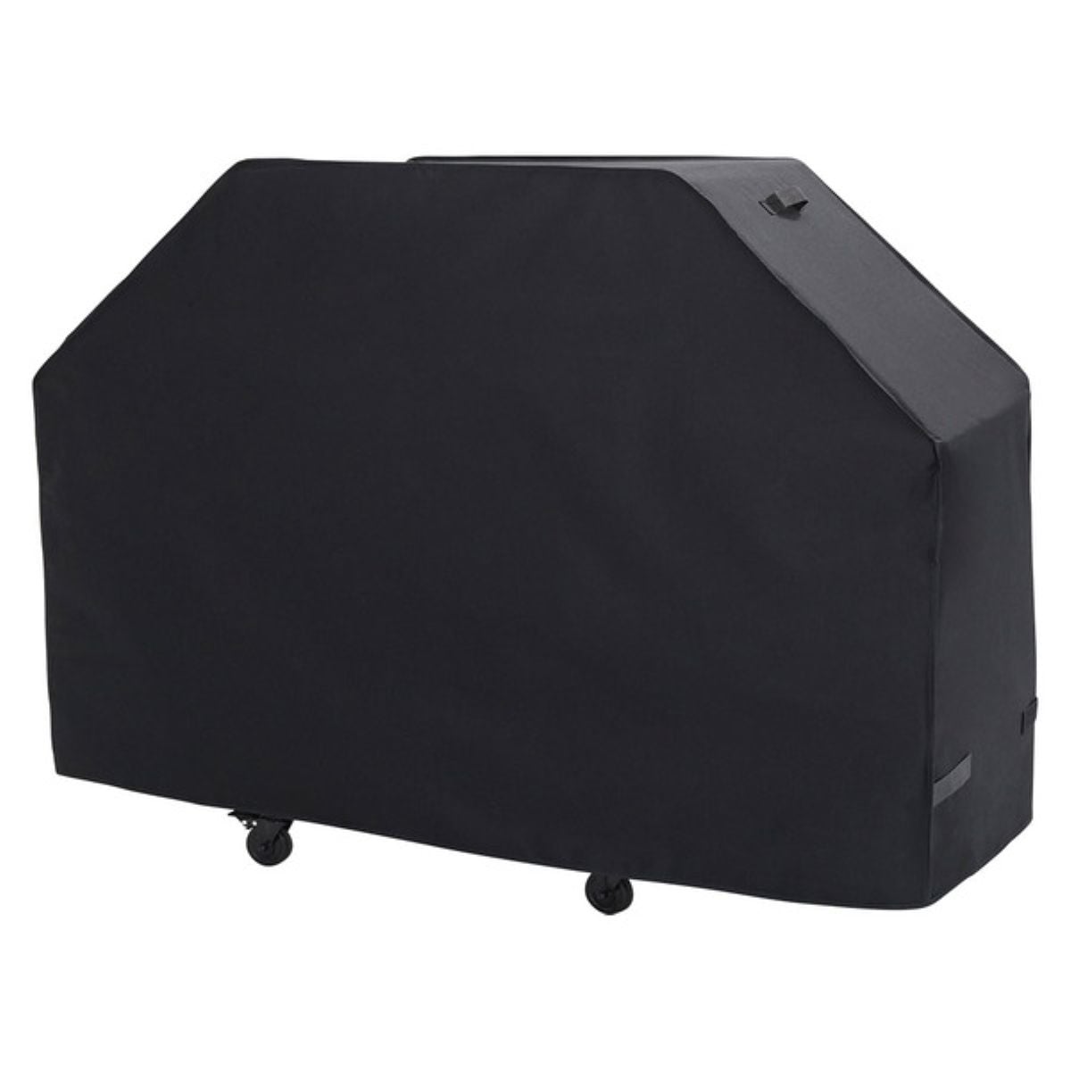 A large black protective cover is placed over a wheeled object, likely a barbecue grill or outdoor equipment, with handles on the sides and two wheels partially visible at the bottom.