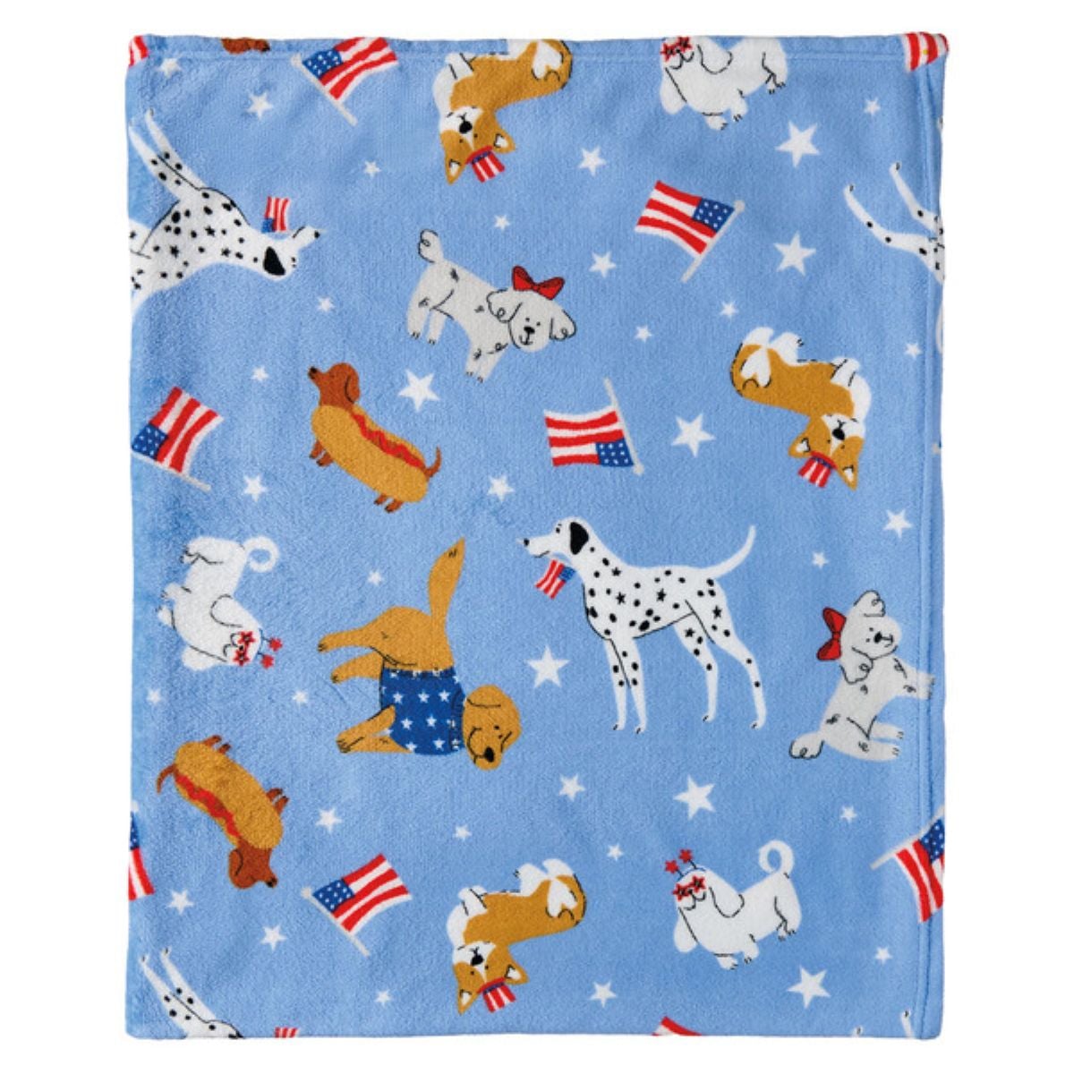 A blue fleece blanket patterned with cartoon dogs in patriotic clothing, American flags, and white stars. The dogs are various breeds and are playfully posed across the fabric.