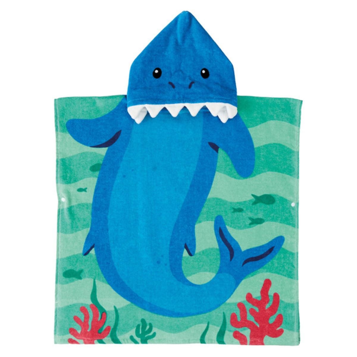 A children's hooded towel designed to look like a blue shark with fins, a tail, a face, and white felt teeth; the background shows wavy water, small fish, and red coral.