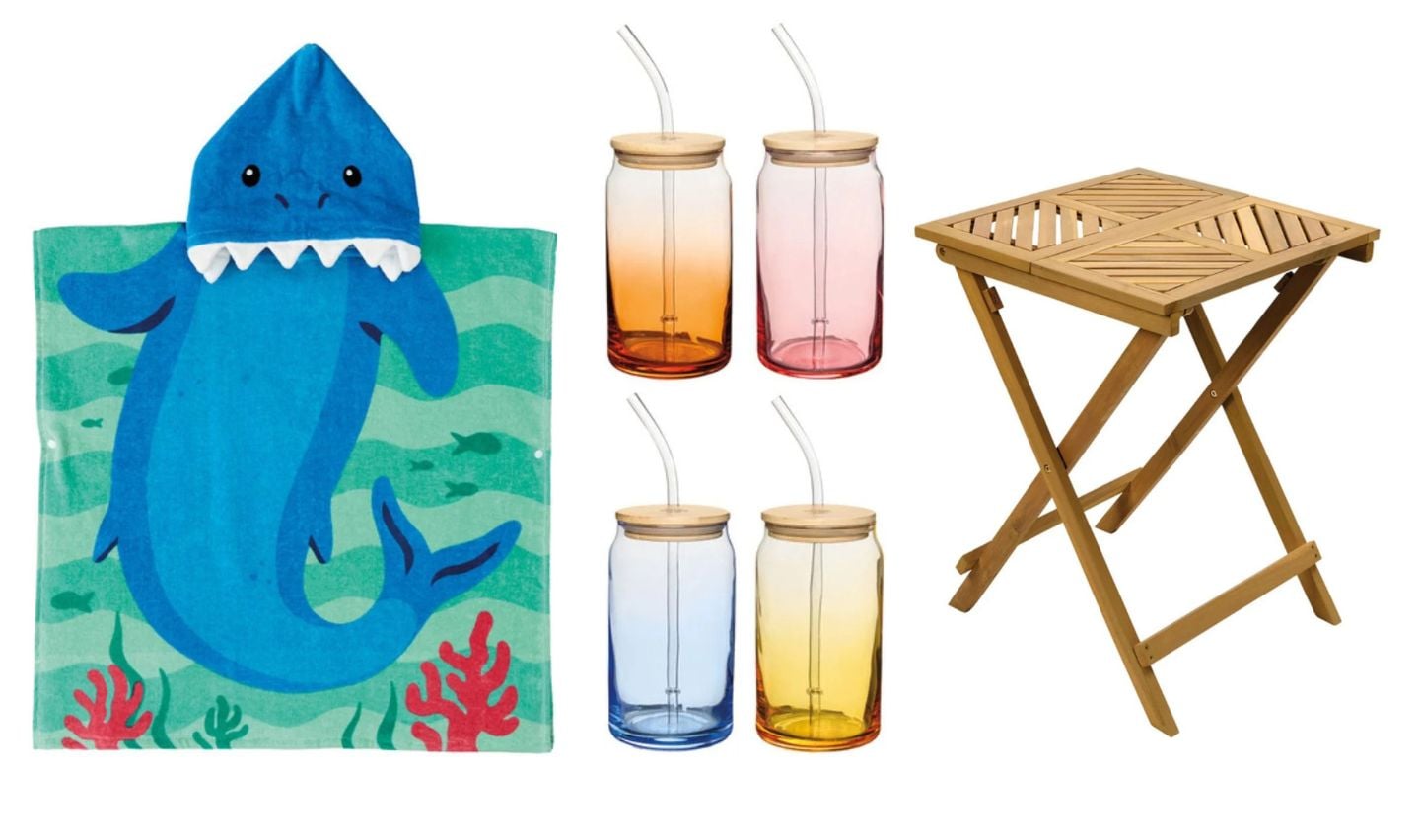 A blue shark-themed hooded towel, four gradient-colored mason jar cups with straws, and a small foldable wooden table—these new Aldi products May 20 are arranged on a white background.