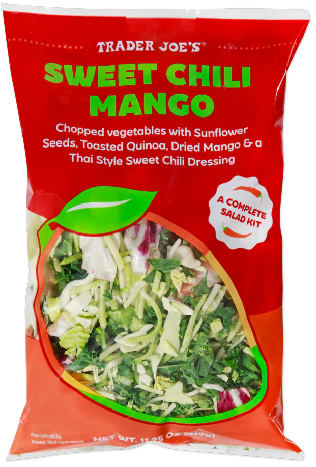 A bag of Trader Joe's Sweet Chili Mango salad kit, featuring chopped vegetables, sunflower seeds, toasted quinoa, dried mango, and Thai-style sweet chili dressing. The packaging is red with a mango illustration.