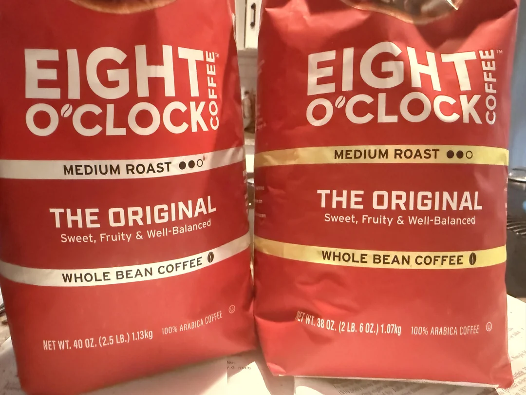 Two red bags of Eight O’Clock Coffee, Medium Roast, Whole Bean, labeled "The Original" and described as "Sweet, Fruity & Well-Balanced." One bag is 40 oz, and the other is 38 oz.