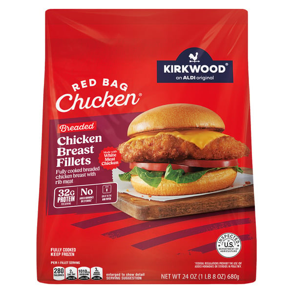 A red bag of Kirkwood Breaded Chicken Breast Fillets from ALDI, featuring an image of a chicken sandwich with lettuce, tomato, cheese, and a breaded chicken fillet. The bag highlights 32g protein and no added hormones.