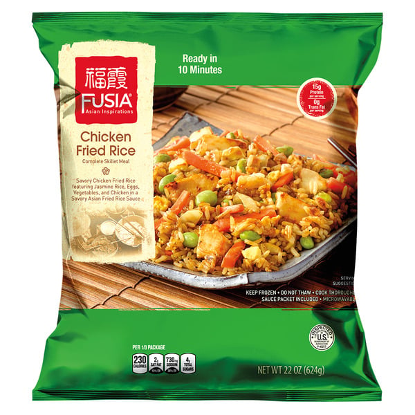 A package of Fusia Asian Inspirations Chicken Fried Rice, showing an image of cooked fried rice with vegetables and chicken on a plate. The package highlights that it’s ready in 10 minutes and contains 22 oz (624g).