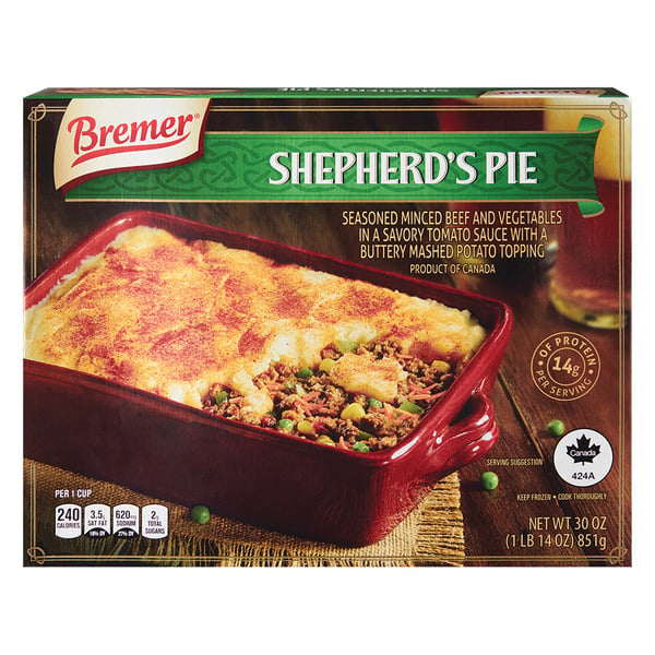 A box of Bremer Shepherd’s Pie featuring an image of the dish in a red baking dish, topped with golden mashed potatoes. The packaging highlights protein content and product details.