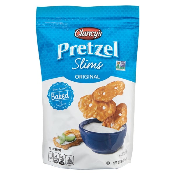 Best Aldi snacks. A blue and white bag of Clancy's Pretzel Slims Original, featuring images of pretzel crisps and a blue bowl of dip with a green garnish on the front. The packaging highlights "Baked" and "Bite-Sized.