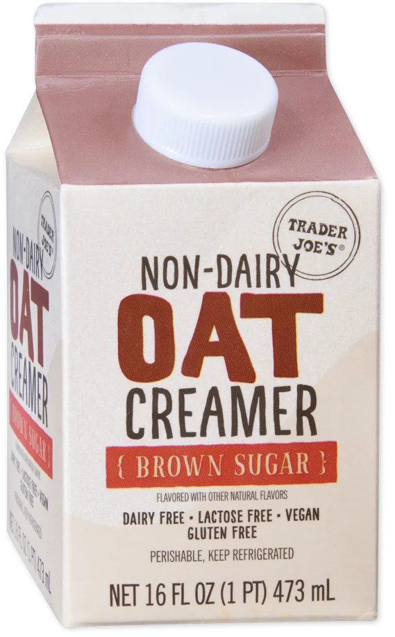 A carton of Trader Joe's Non-Dairy Oat Creamer in brown sugar flavor. The packaging notes it is dairy-free, lactose-free, vegan, gluten-free, and contains 16 fl oz (473 mL).