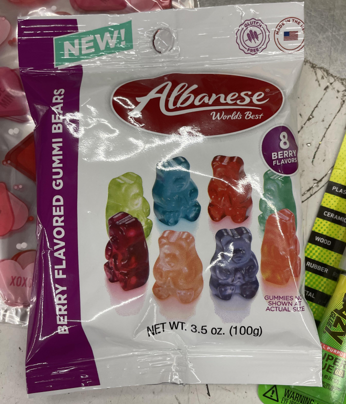 A bag of Albanese brand berry flavored gummi bears, featuring images of six colorful gummy bears on the front and labeled with "8 berry flavors." Weighing 3.5 oz (100g), this is often called the best gummy candy by fans.