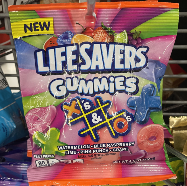 A colorful bag of Life Savers Gummies X's & O's candy, featuring fruit images and gummies shaped like X's and O's. Flavors include watermelon, blue raspberry, lime, pink punch, and grape—perfect for fans of the best gummy candy.