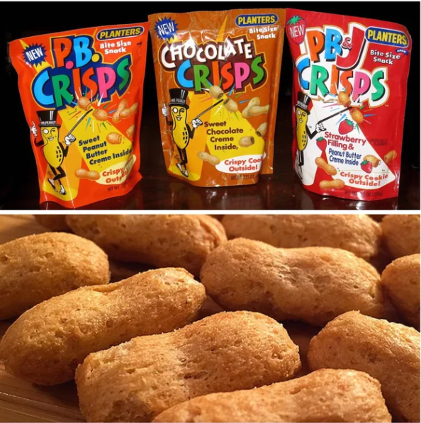 Three colorful bags of Planters PB Crisps snacks are displayed above a close-up of several peanut-shaped, golden-brown crispy cookies on a wooden surface. The flavors include peanut butter, chocolate, and strawberry.