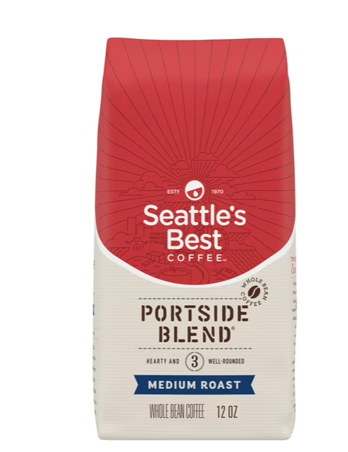 A 12-ounce bag of Seattle's Best Coffee, Portside Blend, Medium Roast, with a red top and cream bottom, featuring bold text and sunburst graphic. The label indicates whole bean coffee and well-rounded, hearty flavor.