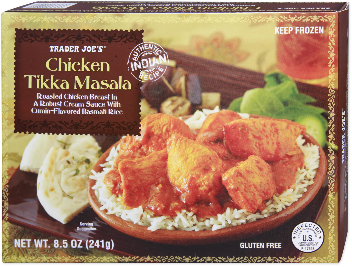 Box of Trader Joe’s Chicken Tikka Masala, showing chunks of chicken in red sauce over rice, with naan bread on the side. The packaging highlights “Authentic Indian Recipe” and “Gluten Free.”