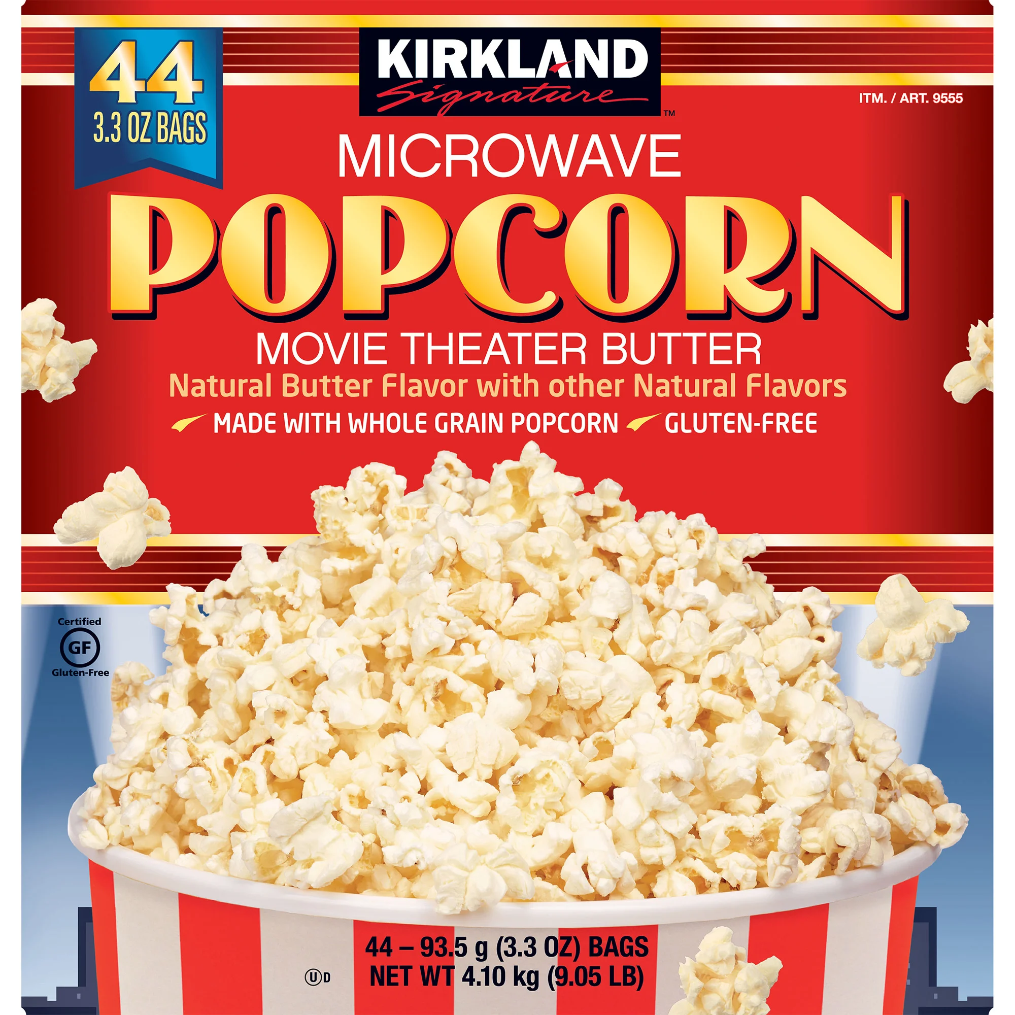 Box of Kirkland Signature Microwave Popcorn, Movie Theater Butter flavor, with popcorn overflowing from a striped tub. Text highlights gluten-free, made with whole grain, and includes 44 bags.