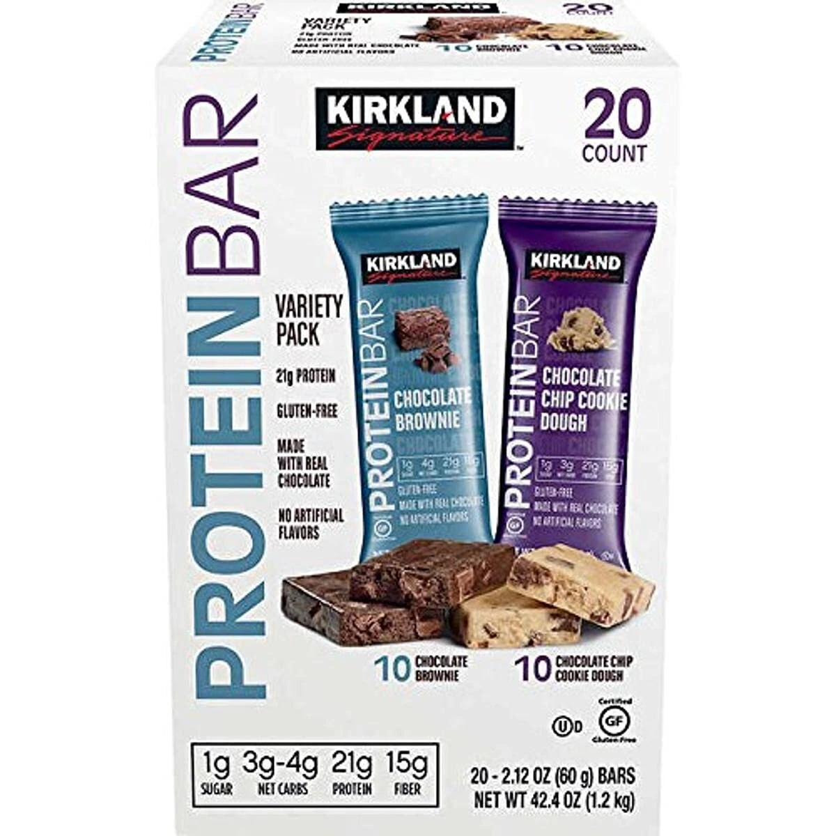 A box of Kirkland Signature Protein Bars, variety pack with 20 bars. The box shows two flavors: Chocolate Brownie and Chocolate Chip Cookie Dough, with images of each bar, and highlights protein, sugar, and fiber content.