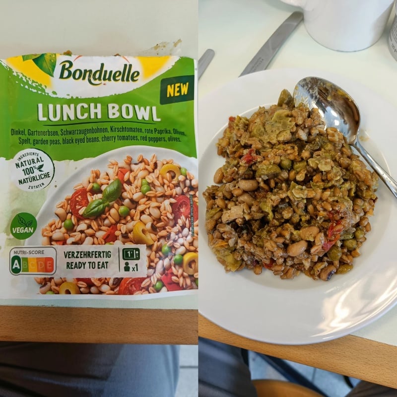 A Bonduelle Lunch Bowl package is shown on the left, and on the right, its cooked contents—a mixed grain and bean dish—are served on a white plate with a spoon.