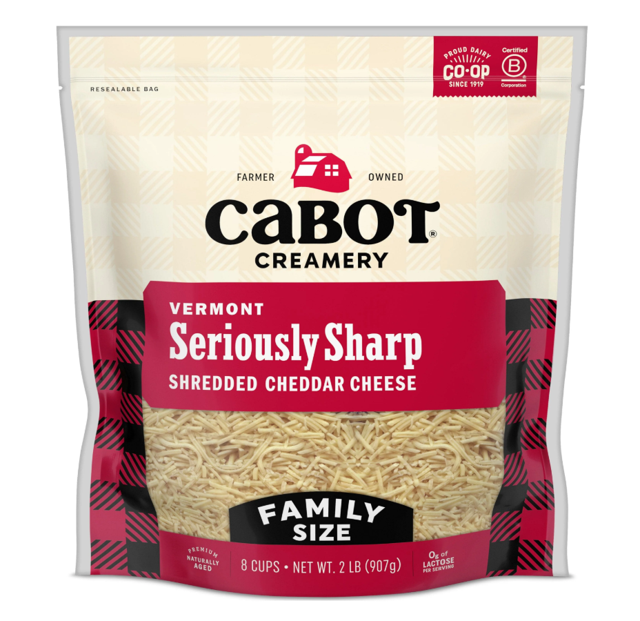 A 2-pound family size bag of Cabot Creamery Vermont Seriously Sharp Shredded Cheddar Cheese, featuring a resealable top and red label—perfect for those seeking the best shredded cheese for every meal.
