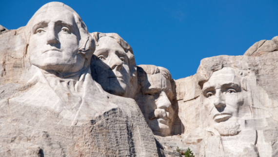Mount Rushmore National Memorial features four large presidential faces sculpted into a granite mountain, set against a clear blue sky&mdash;an unforgettable sight for any visitor. For those who value smart travel backup plans, this iconic landmark offers nearby attractions and activities to ensure your trip remains memorable, no matter what.