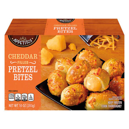 Box of Appetitos Cheddar Filled Pretzel Bites, showing cheesy pretzel bites on a plate with cheddar cheese pieces and product details like net weight and instructions to keep frozen and cook thoroughly.