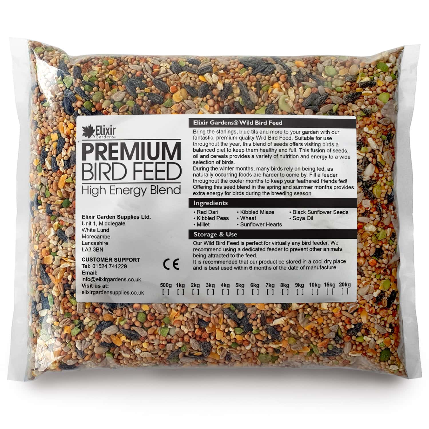 A clear plastic bag of Elixir Premium Bird Feed High Energy Blend showing mixed seeds inside. The label lists ingredients, usage instructions, storage info, and contact details.