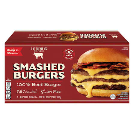 A red box of Cattlemen’s Ranch Smashed Burgers shows a photo of cheeseburgers with bacon. The label highlights 100% beef, all natural, gluten free, and contains eight 4-oz burgers.