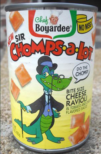 A can of Chef Boyardee Sir Chomps-a-Lot bite size cheese ravioli, featuring a cartoon alligator in a tuxedo and top hat, holding a cane and saying "Do the Chomp!