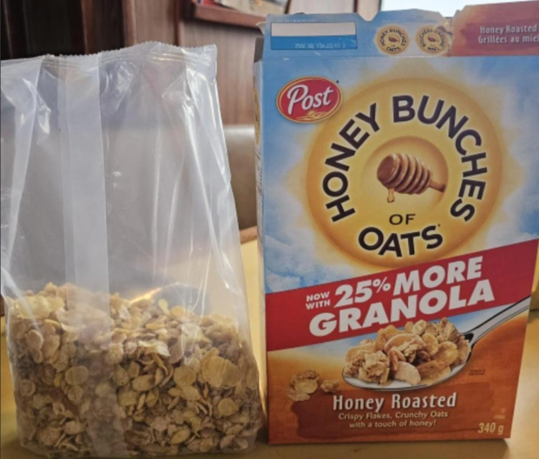 A partially filled bag of cereal sits next to its box labeled "Honey Bunches of Oats Honey Roasted" with "25% More Granola" on the front. The box and bag are both open on a table, perfectly illustrating the trend seen in photos of shrinking products.