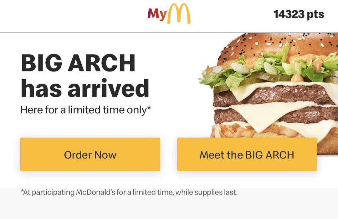 McDonald's ad for the Big Arch burger, showing a large burger with lettuce, cheese, and two patties. Buttons read "Order Now" and "Meet the BIG ARCH." Offer is available for a limited time.
